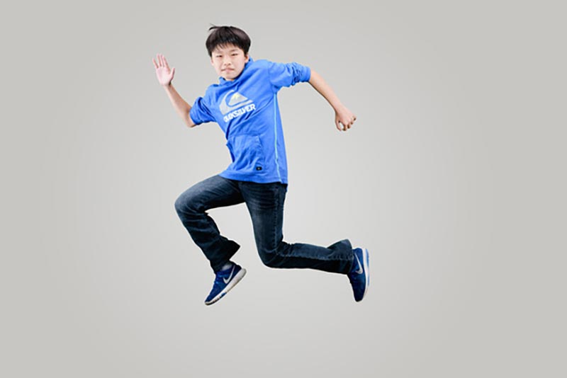 boy jumping in air